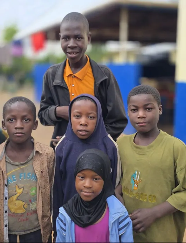 Five children from New Hope standing together