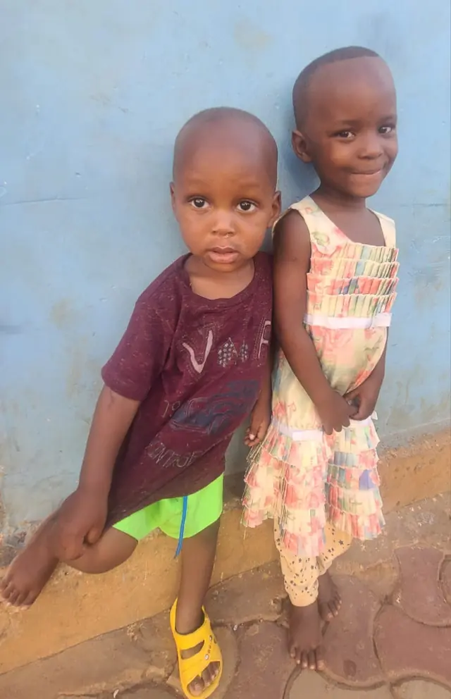 Two little children at the centre