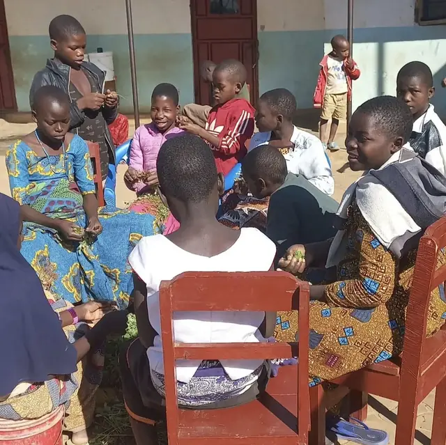 Children sitting in a story circle